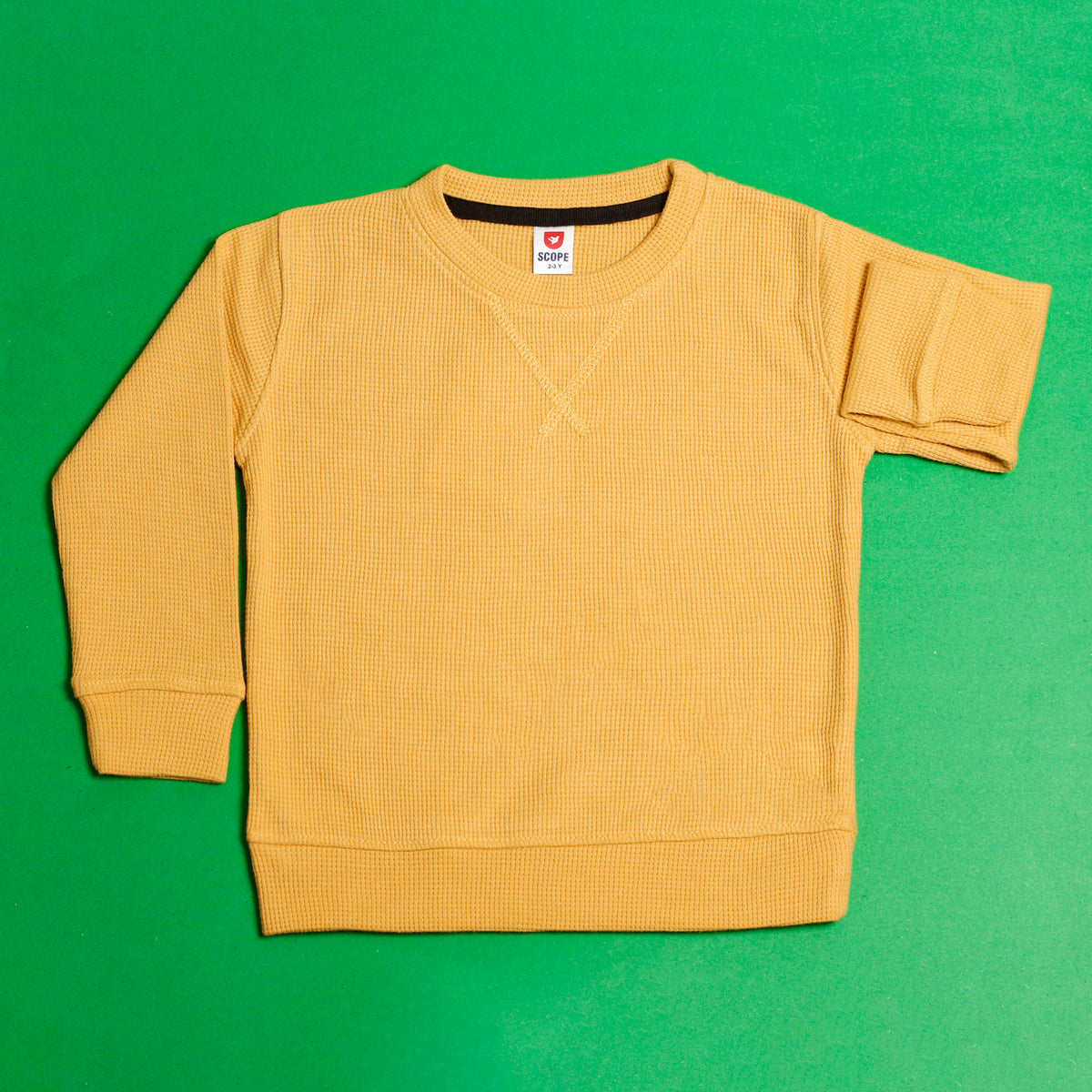 Mustard waffle knit sweatshirt flat lay