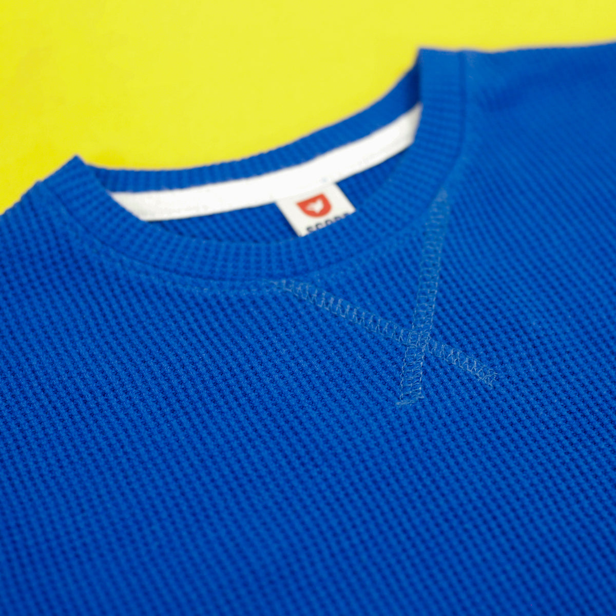 Royal waffle knit sweatshirt neckline close up